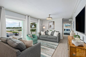 NEW! Upscale Dog Friendly and STEPS to the Beach! Spacious Modern Chic Condo!